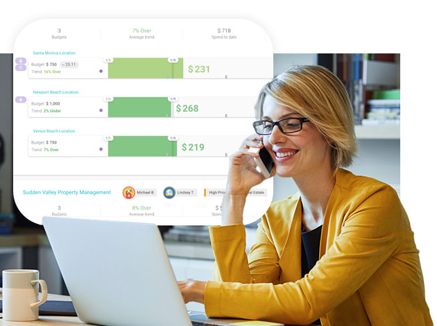 Woman on phone checks revenue.